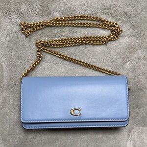 Coach Evie wallet with Chain.  Light Blue Leather